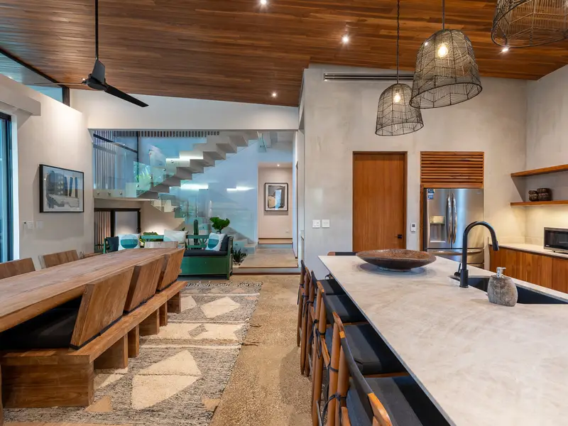 Open-plan dining and kitchen bathed in daylight