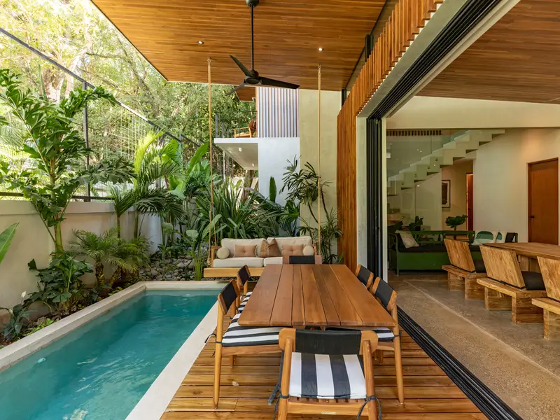 Kirana Nosara private pool and covered outdoor dining terrace at dusk