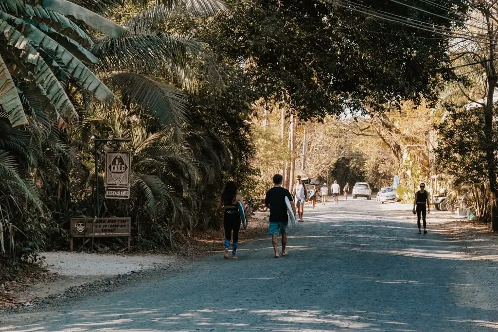 Walking one of Guiones' shaded jungle roads (photo courtesy of Haley Blackall)